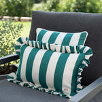 another mondaen Outdoor Kissen Ruffled Charm Forest auf Gartenlounge – grün-weiß gestreifte Designkissen für Terrasse und Garten aus der VACANCES Outdoor Kollektion