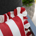 another mondaen Outdoor Kissen Ruffled Charm Forest auf Gartenlounge – rot-weiß gestreifte Designkissen für Terrasse und Garten aus der VACANCES Outdoor Kollektion