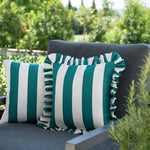 another mondaen Outdoor Kissen Ruffled Charm Forest auf Gartenlounge – grün-weiß gestreifte Designkissen für Terrasse und Garten aus der VACANCES Outdoor Kollektion