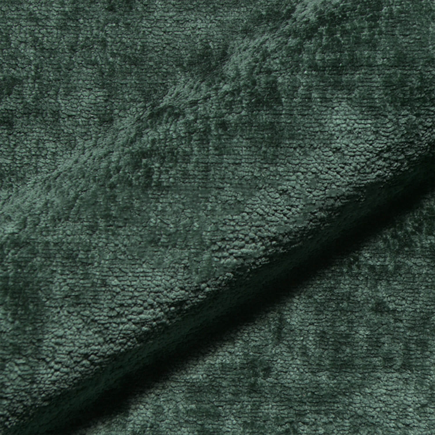 Nahaufnahme des Teddystoffs in forest-grün mit dichter, weicher Struktur – hochwertiges Gewebe der Monochrom Teddy Kissen von another mondaen.