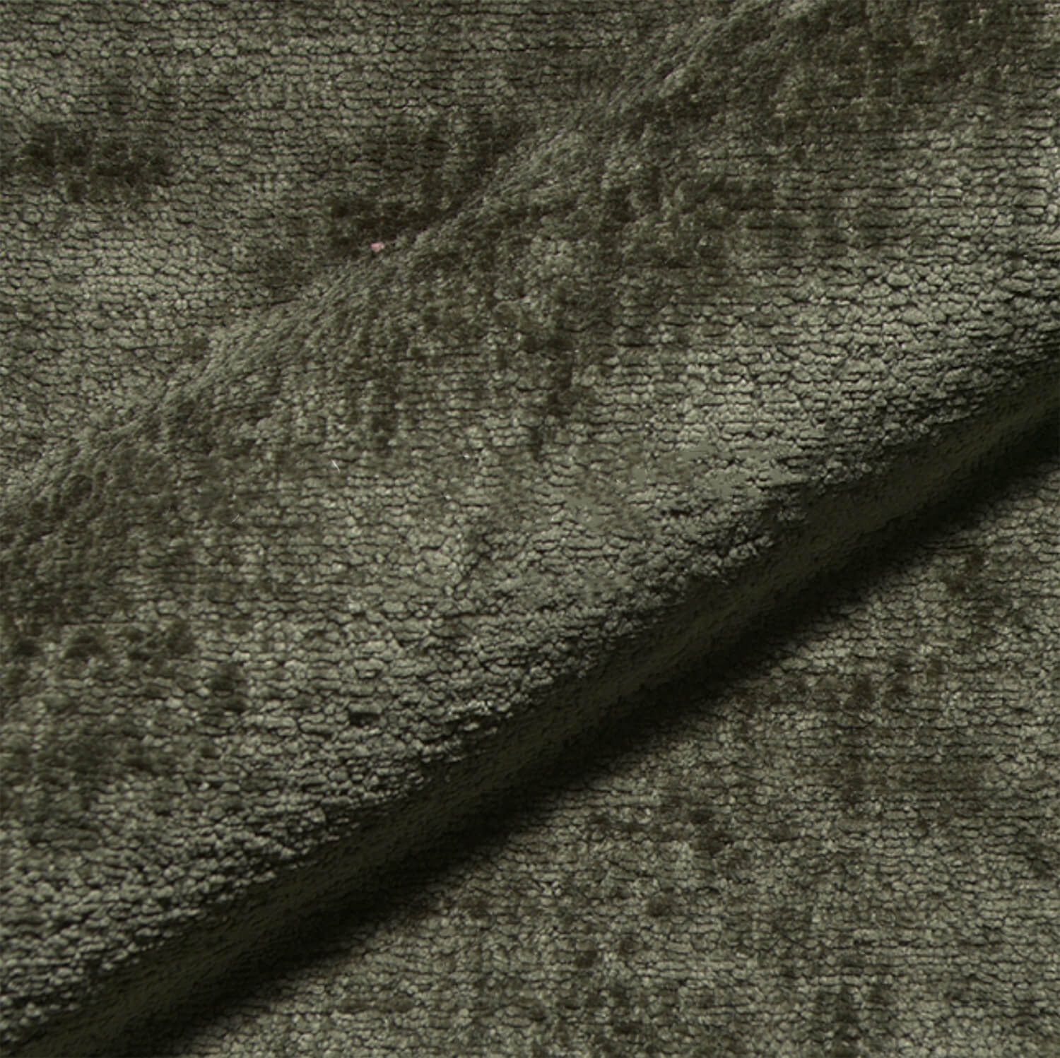 Nahaufnahme des Teddystoffs in Olive-Grün mit dichter, weicher Struktur – hochwertiges Gewebe der Monochrom Teddy Kissen von another mondaen.
