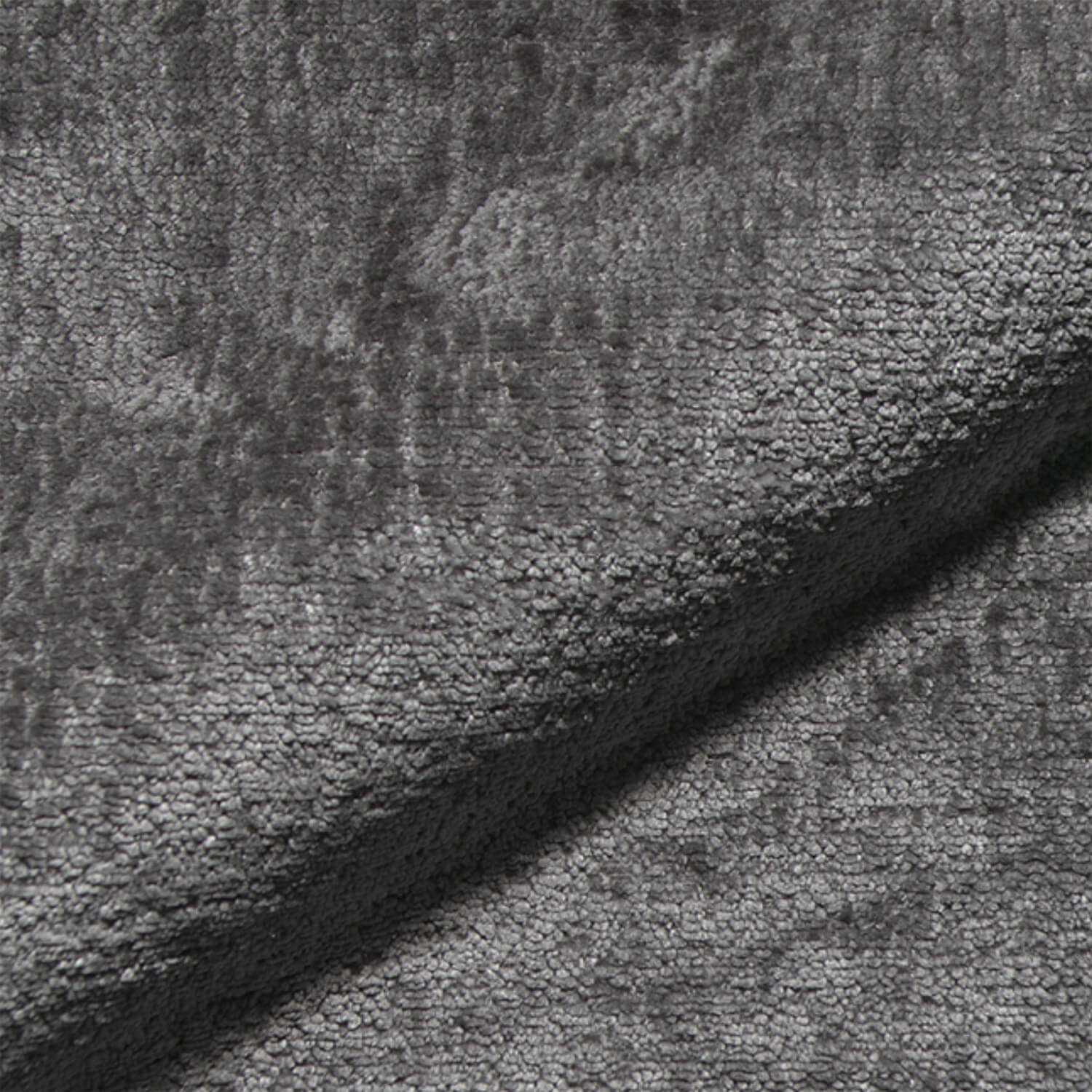 Nahaufnahme des Teddystoffs in grau mit dichter, weicher Struktur – hochwertiges Gewebe der Monochrom Teddy Kissen von another mondaen.